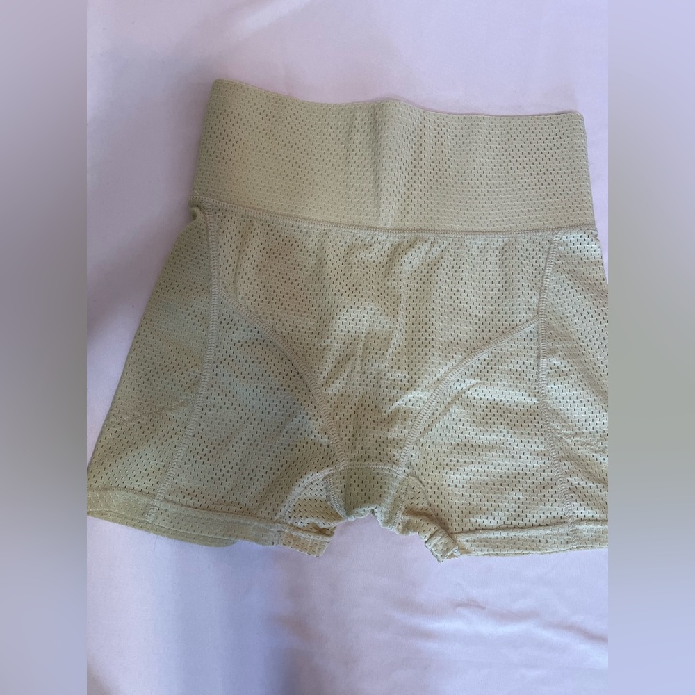 Size small bike shorts. Light tan color.